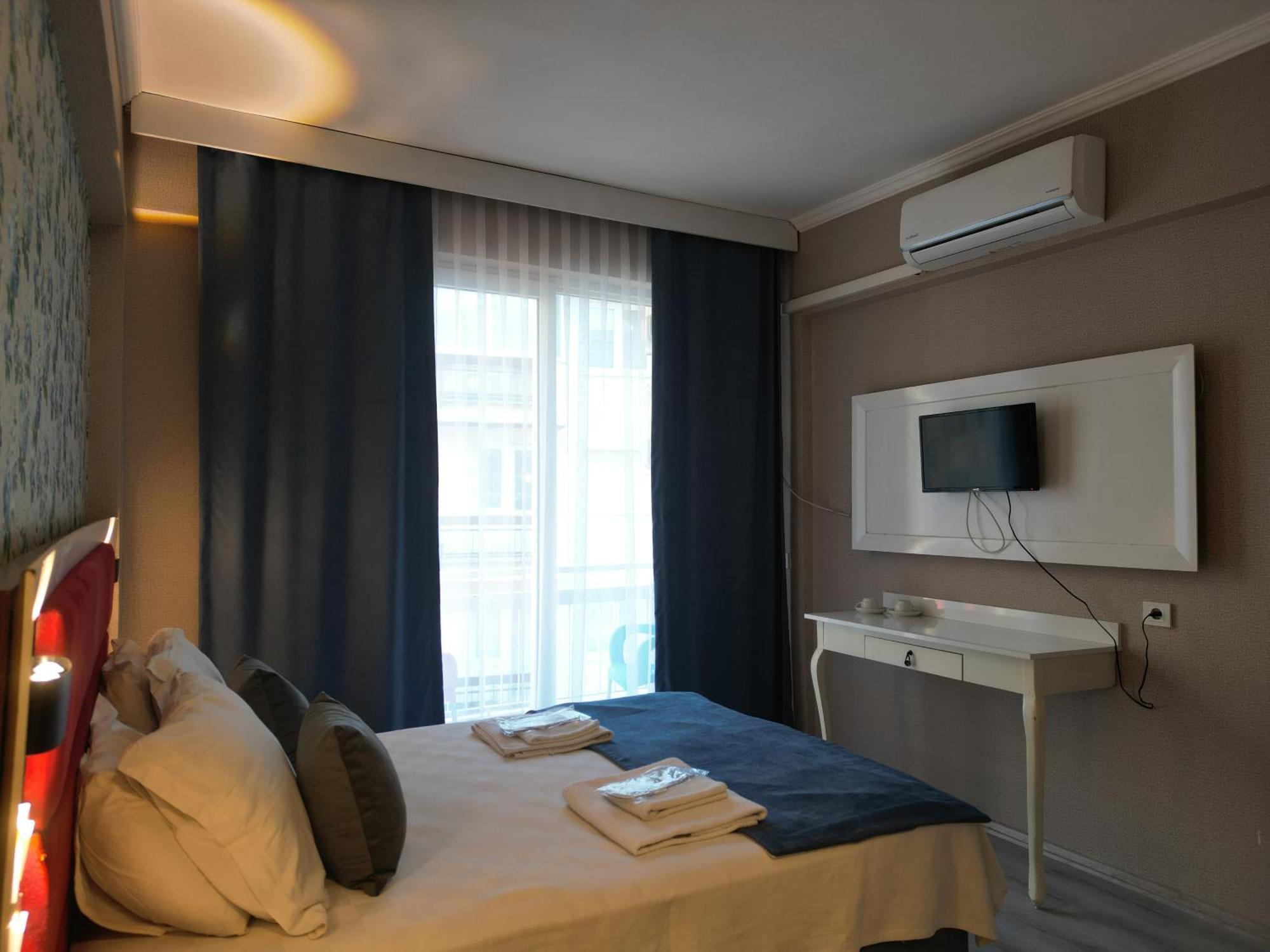 Akman City Hotel Кушадасъ Екстериор снимка