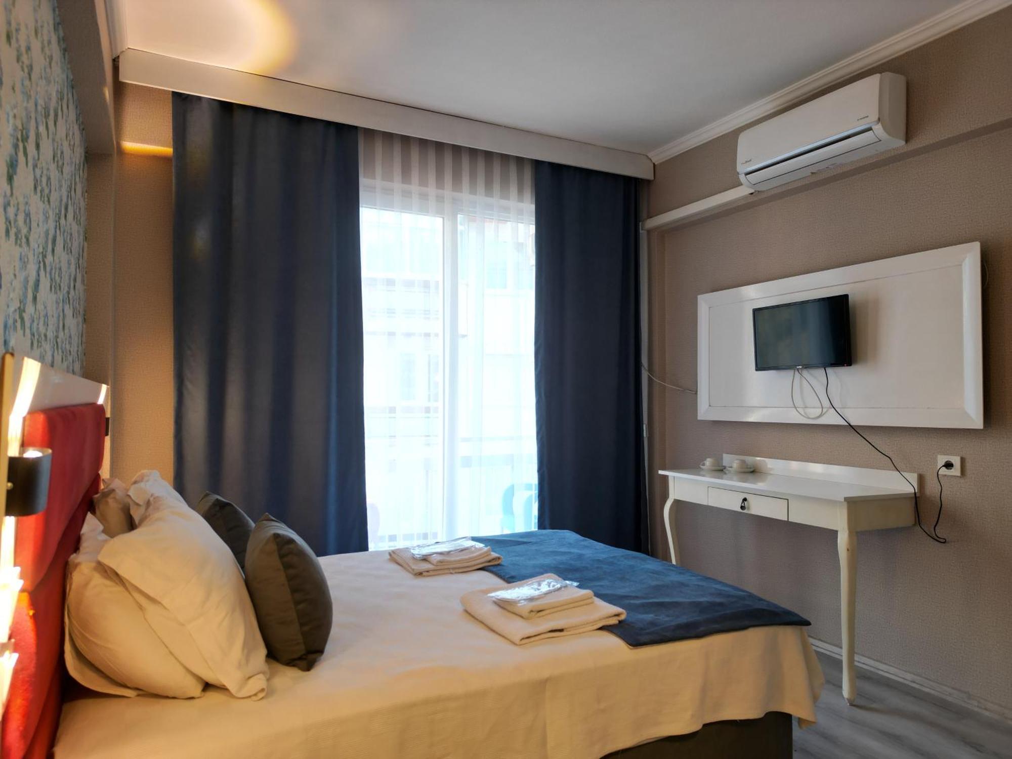 Akman City Hotel Кушадасъ Екстериор снимка